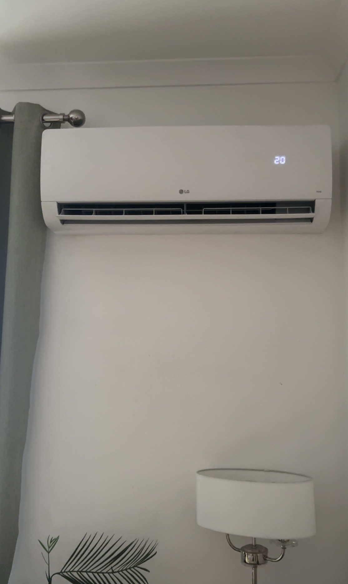 LG DualCool indoor wall unit fitted in a bedroom near Redditch